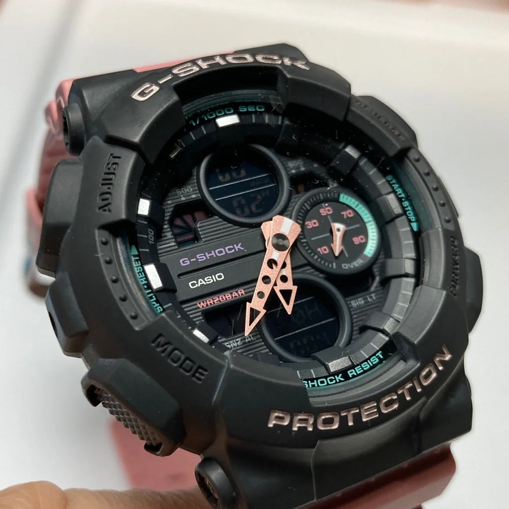 Casio Gshock, GMA-S140, gray bezel, dusty pink strap and accents working battery
